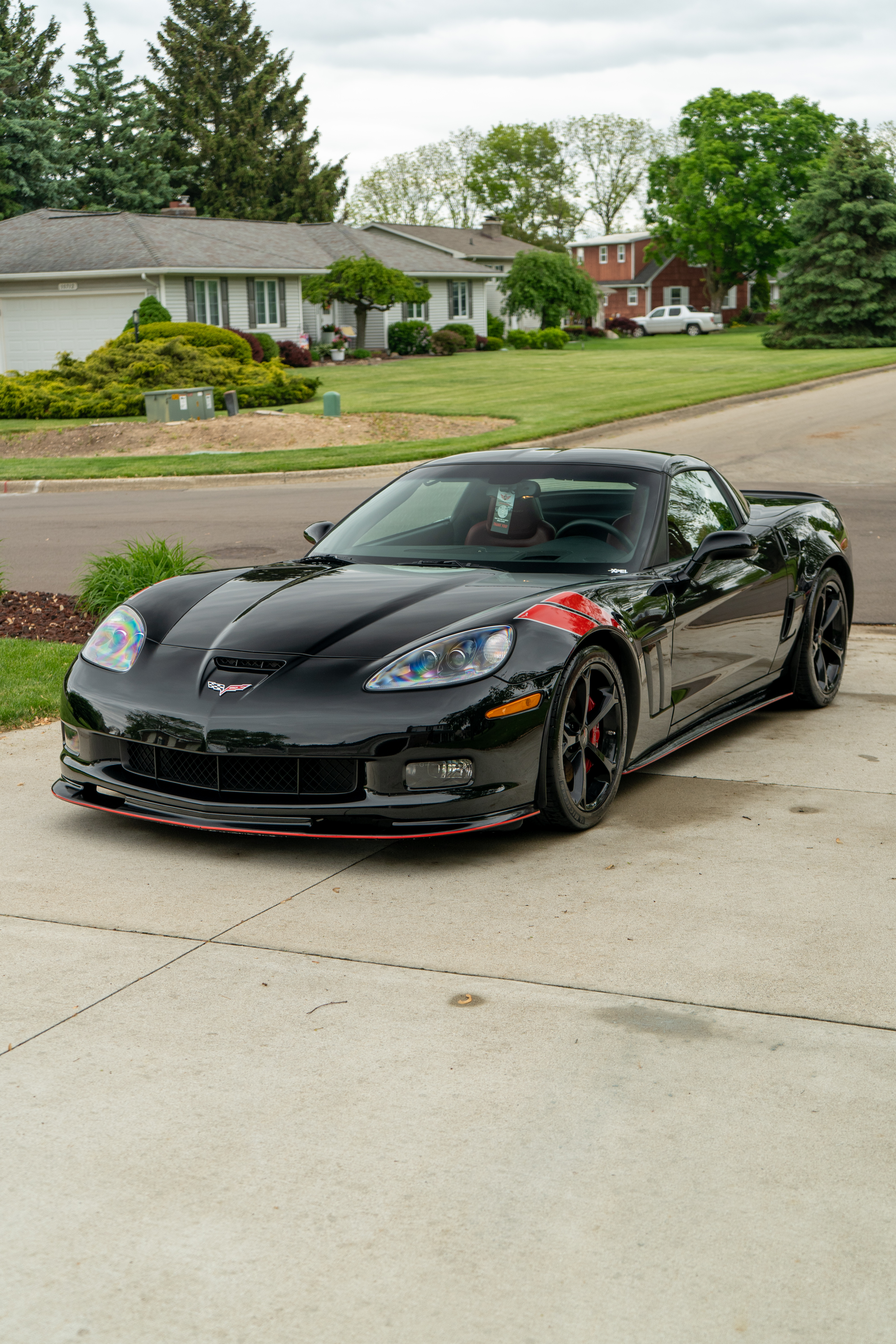 Black Chevrolet Corvette with System X ceramic coating by After Hours, side profile