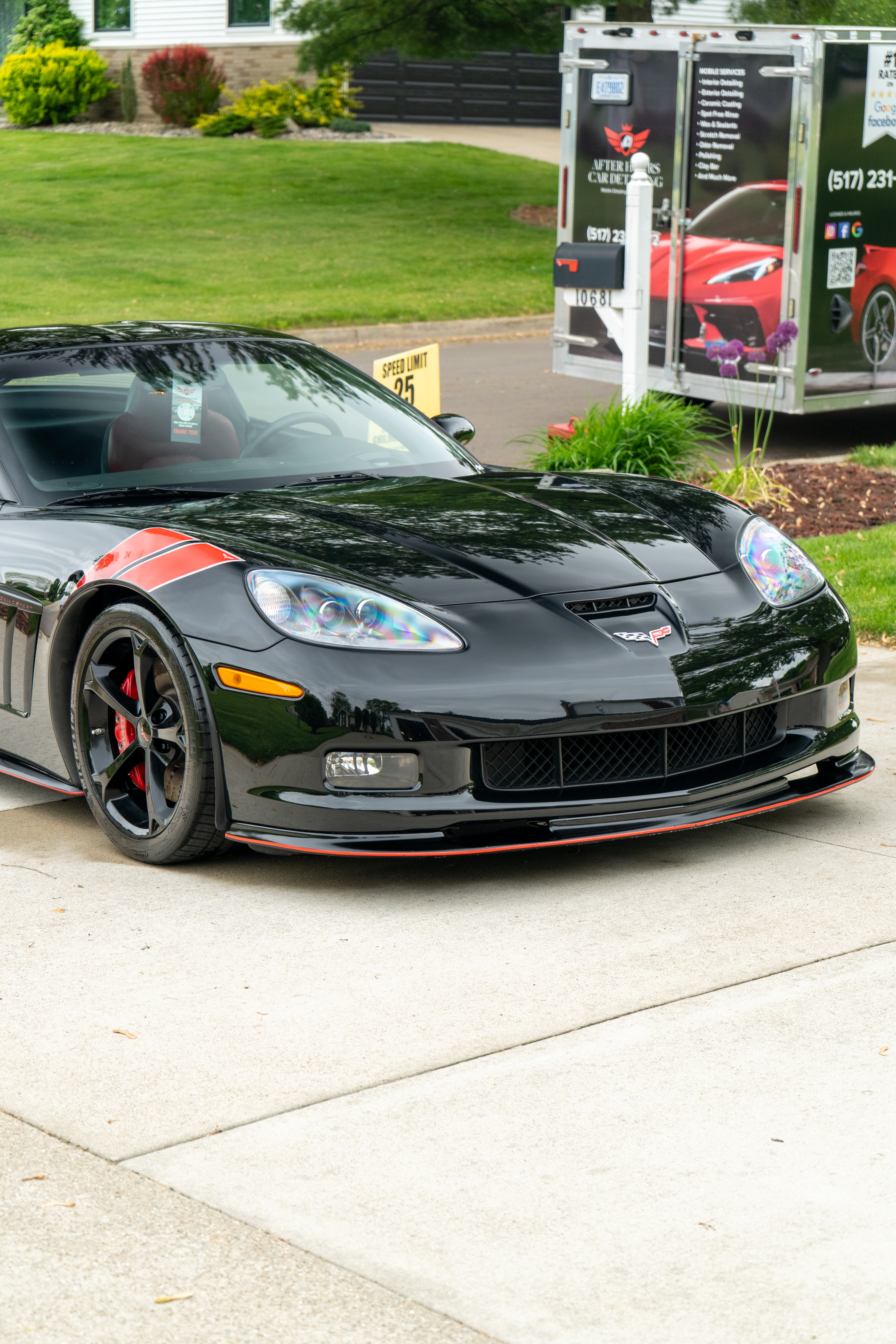 Black Chevrolet Corvette with System X ceramic coating, rear quarter view