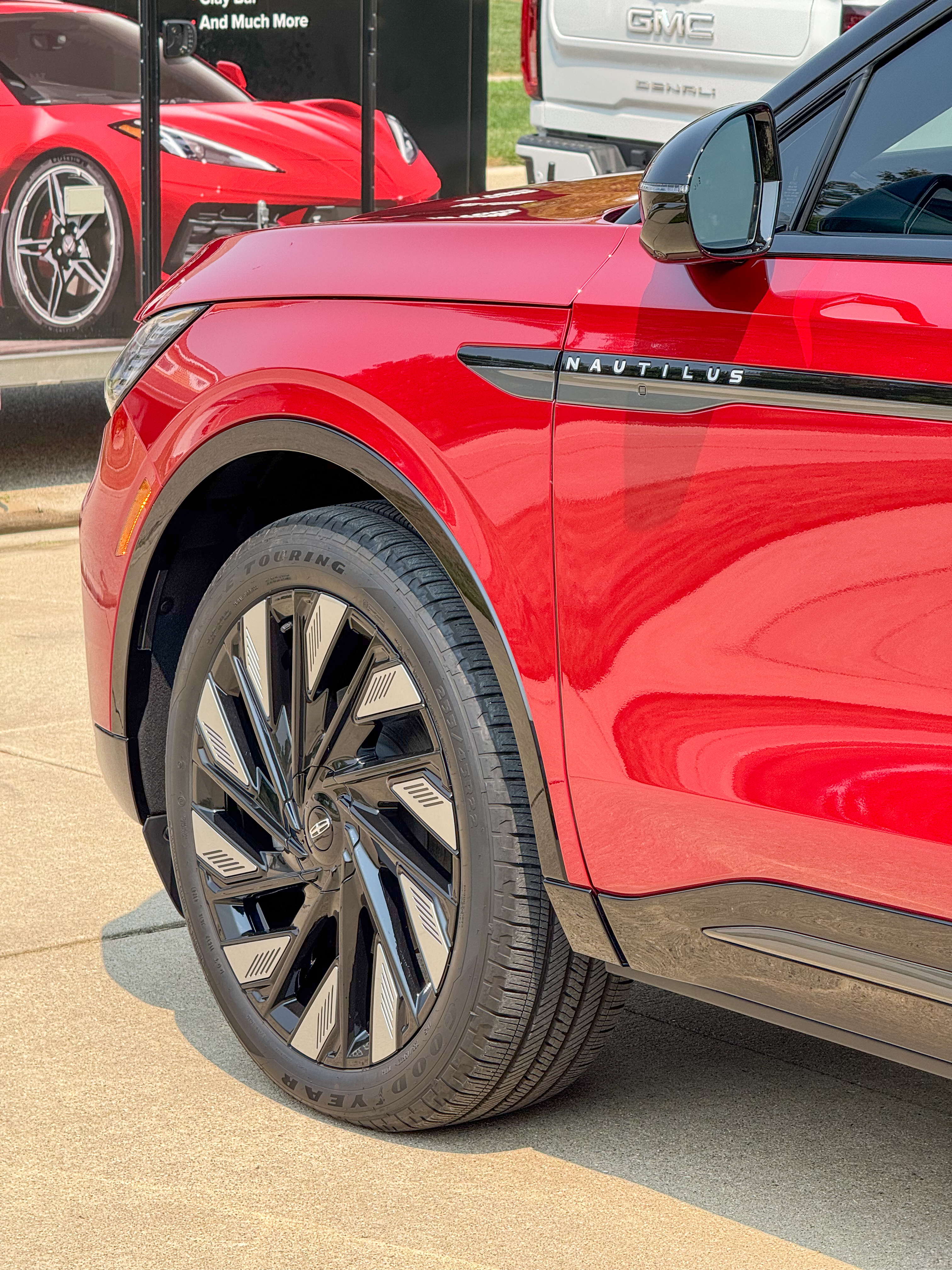 Red Lincoln Nautilus with System X ceramic coating, front quarter detail