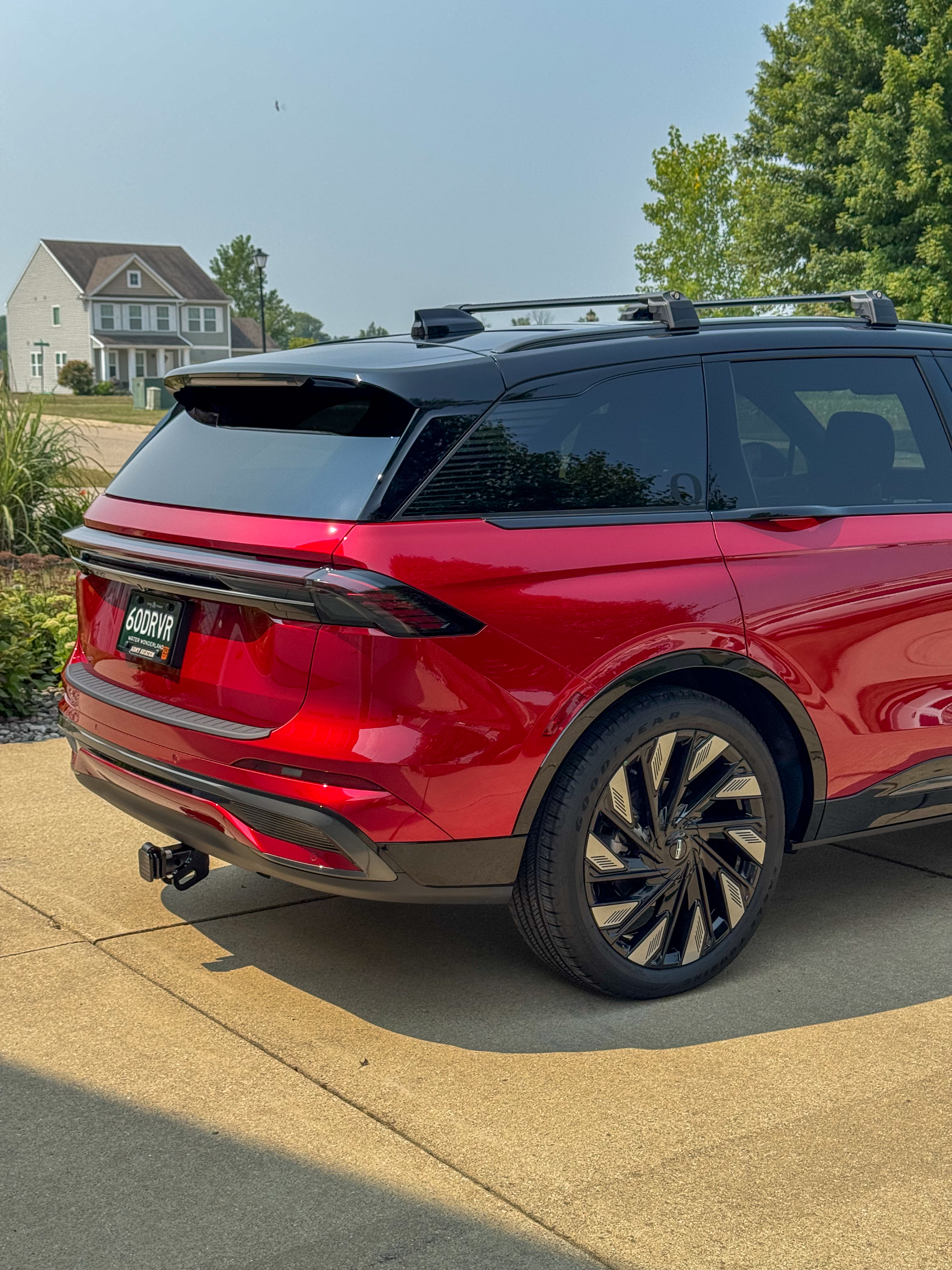 Red Lincoln Nautilus with System X ceramic coating, rear three-quarter view
