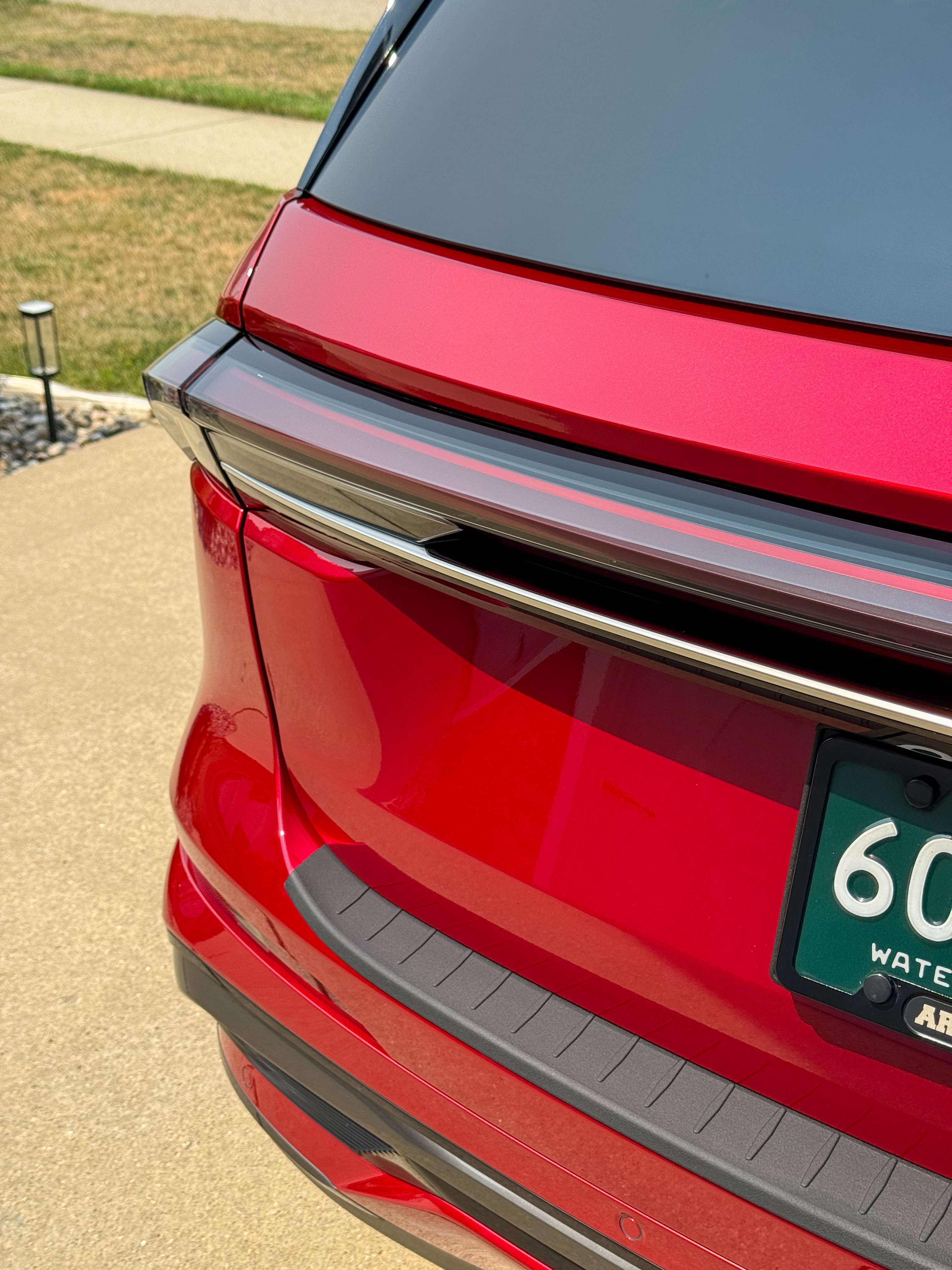 Red Lincoln Nautilus with System X ceramic coating, rear detail showing reflective gloss