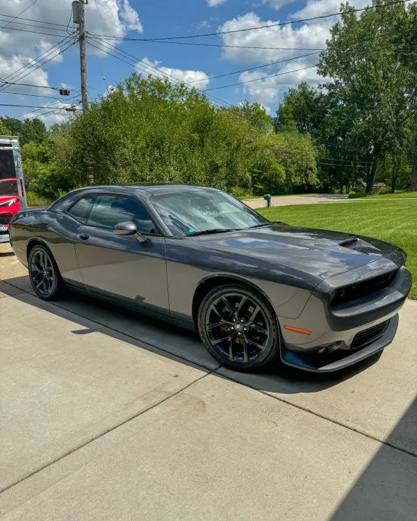 Dodge Challenger with a glossy System X Renew ceramic coating by After Hours Car Detailing in Mid-Michigan