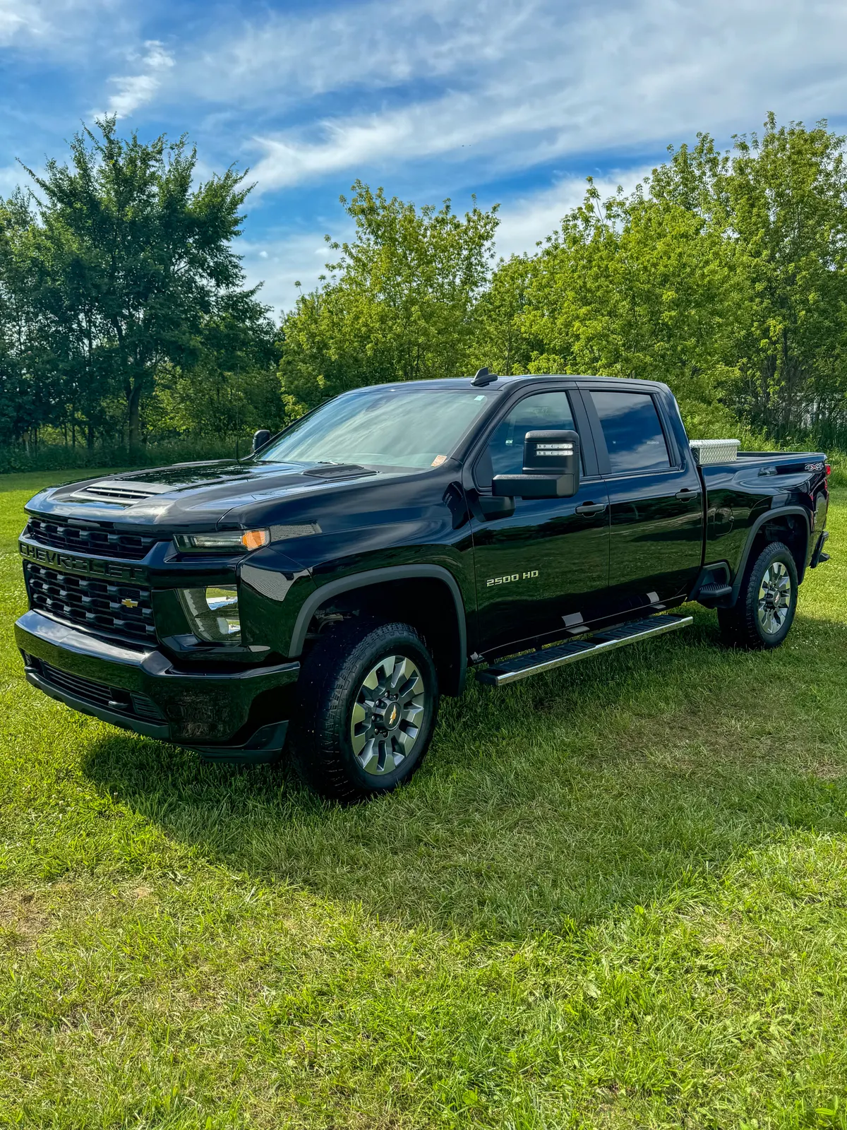 Black Chevrolet Silverado 2500 HD after a System X Renew ceramic coating by After Hours Car Detailing in Mid-Michigan