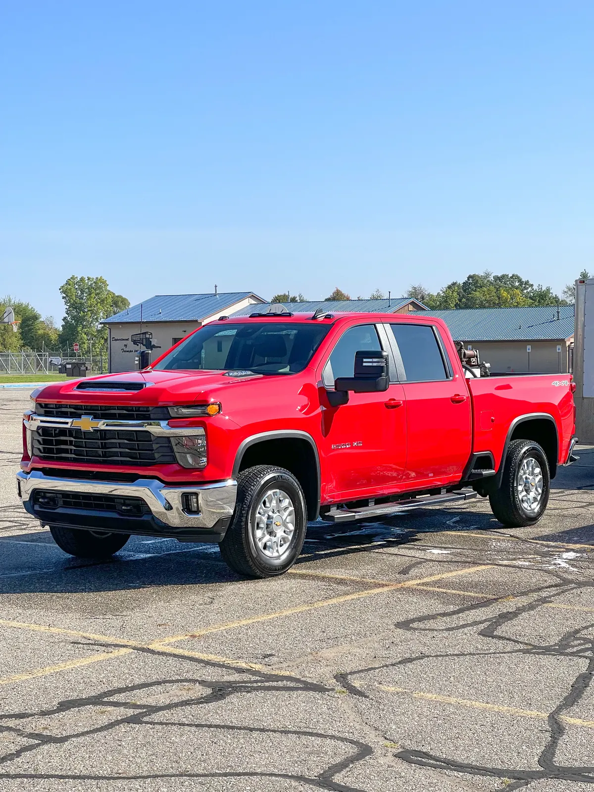 Red Chevrolet Silverado after a System X Renew ceramic coating by After Hours Car Detailing in Mid-Michigan