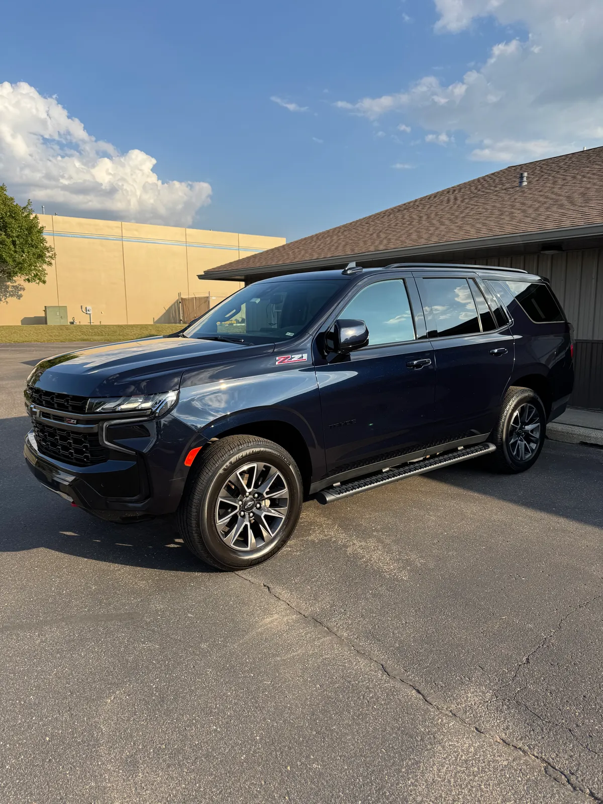 Dark blue Chevy Tahoe Z71 after a paint correction and System X Crystal+ ceramic coating by After Hours Car Detailing