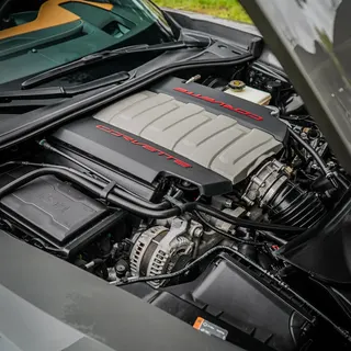 Spotless detailed engine bay of a C7 Corvette after an engine bay detail by After Hours Car Detailing