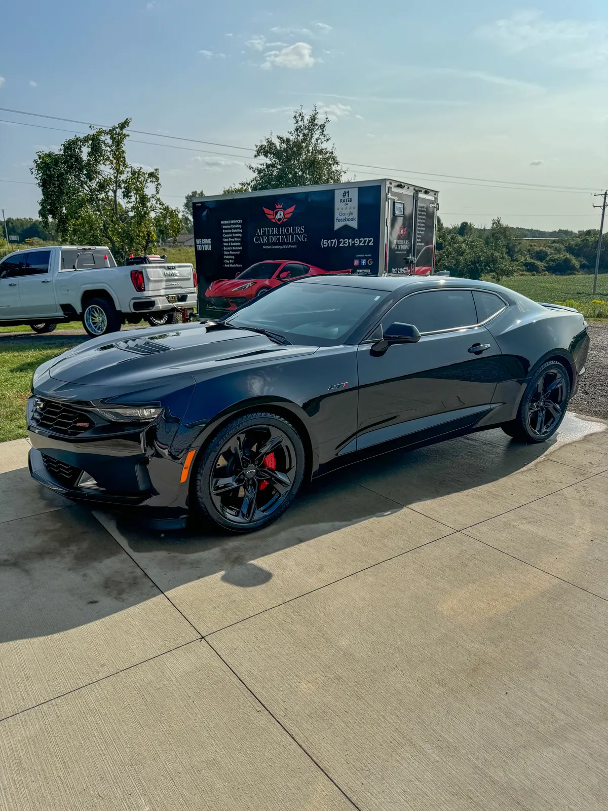 Black Chevrolet Camaro after a full interior, exterior, and engine bay detail by After Hours Car Detailing in Mid-Michigan