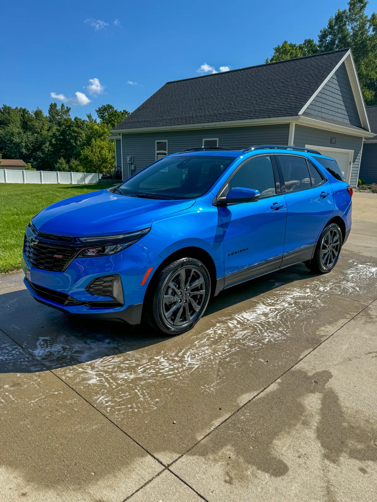 Blue Chevrolet Equinox RS after a full detail by After Hours Car Detailing in Mid-Michigan