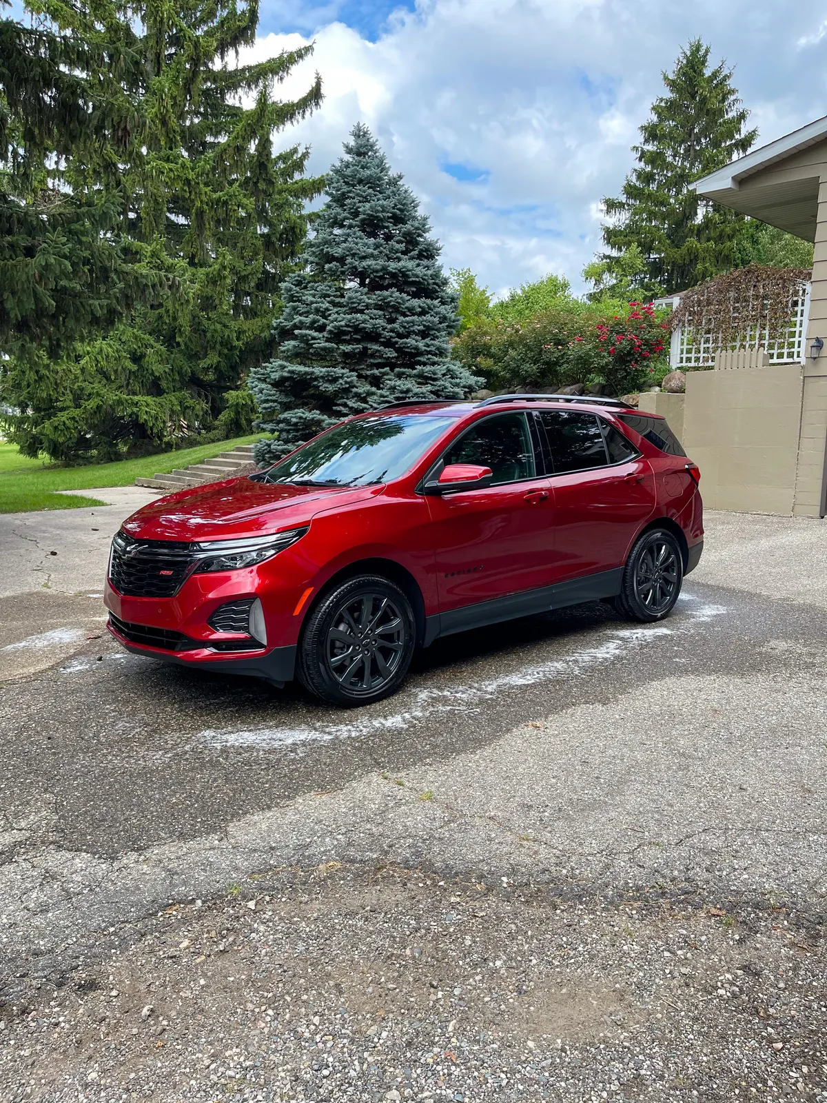 Red Chevrolet Equinox RS after a full detail by After Hours Car Detailing in Mid-Michigan