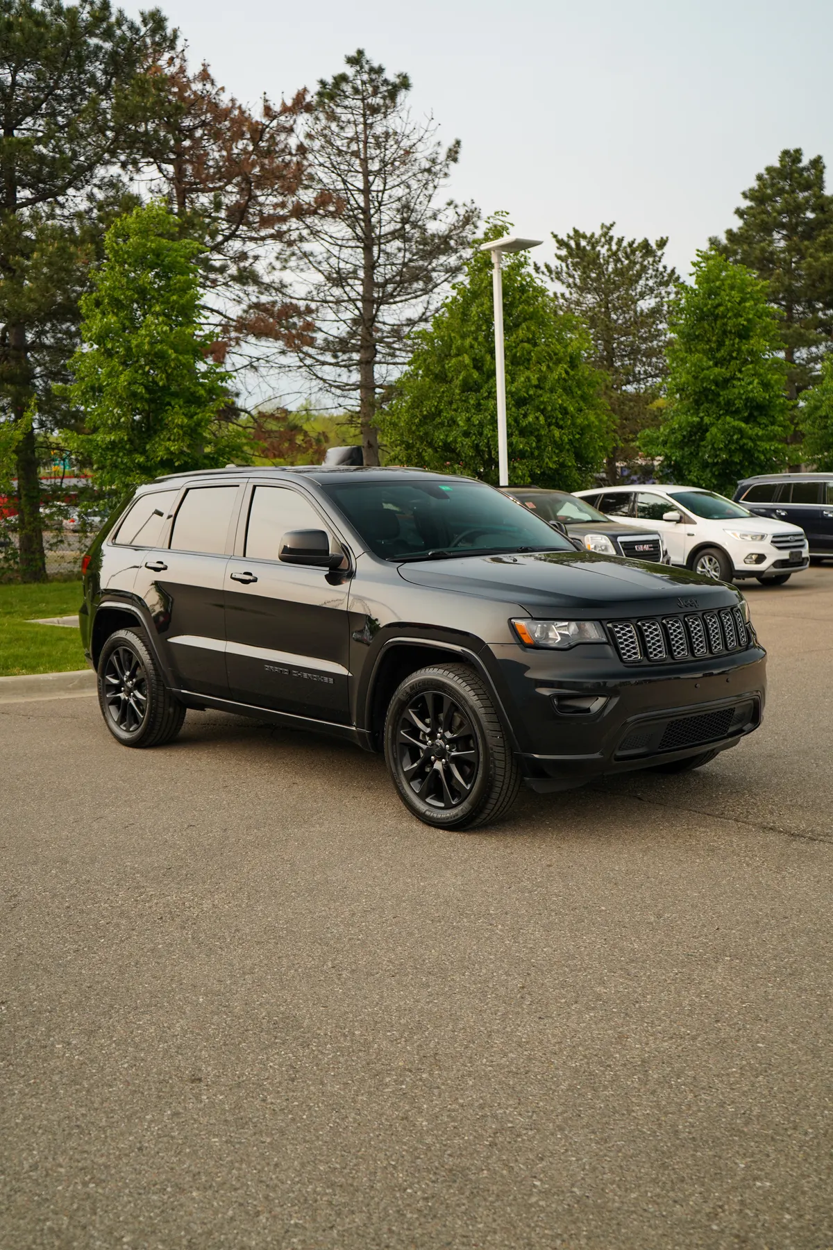 Black Jeep Grand Cherokee Altitude after a full detail by After Hours Car Detailing in Mid-Michigan